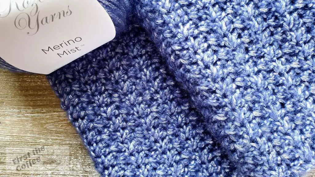 upclose image of the Ava Crochet Scarf with a ball of Rozetti Merino Mist Yarn