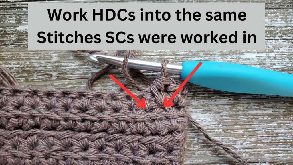 Arrows pointing to where to work HDC stitches