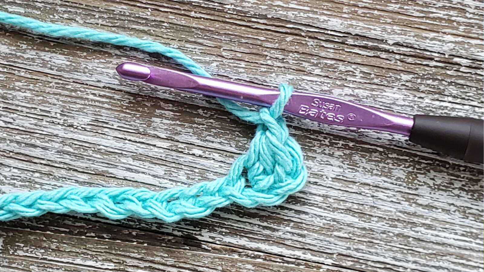 One completed hdc stitch in 4th chain from hook in the foundation chain.