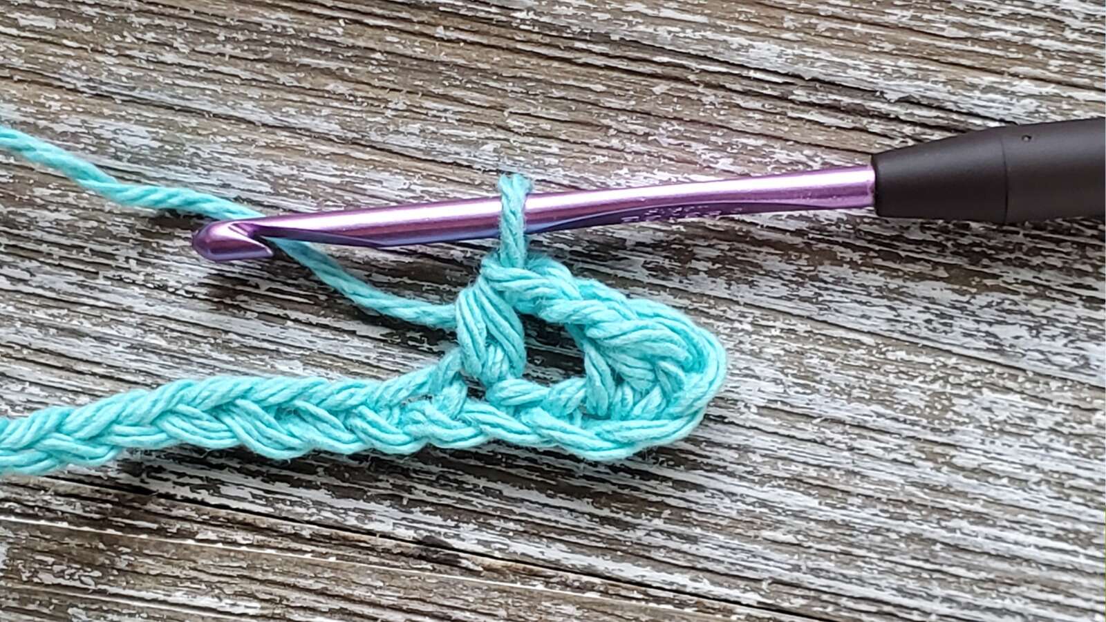 Two half double crochet stitches when creating the hdc moss stitch.