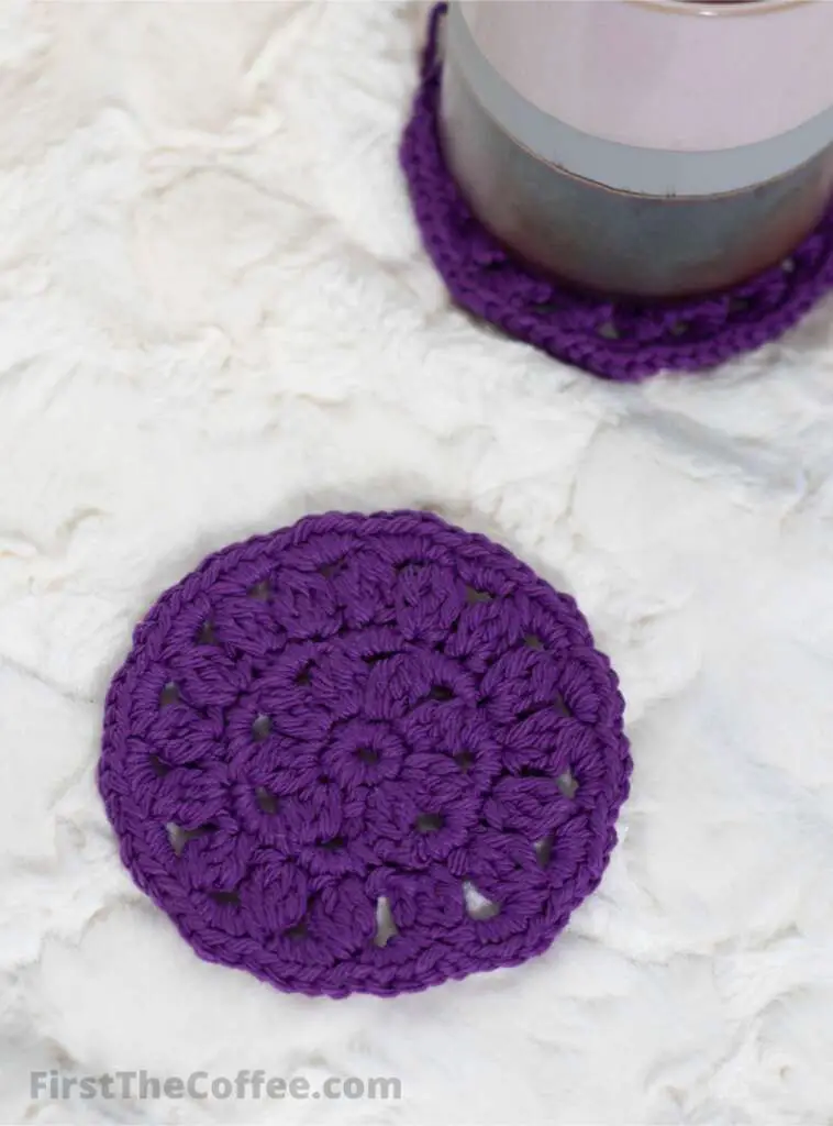 Petalicious Crochet Coaster in purple, made with Lily's Sugar and Cream Cotton Yarn