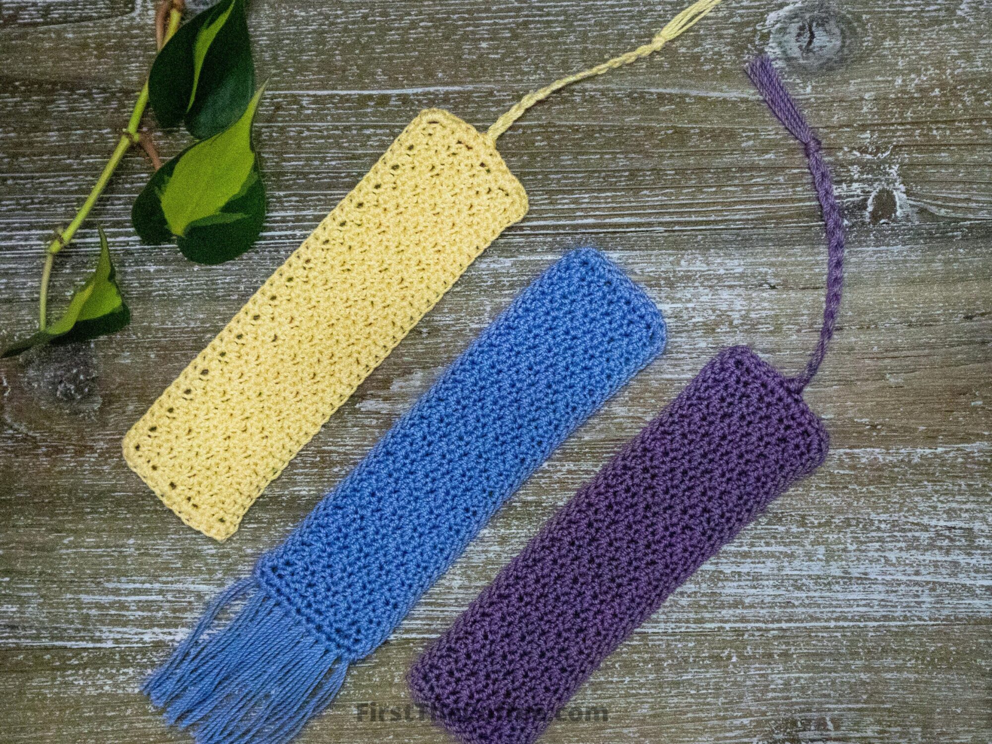 All 3 crochet bookmarks, one with fringe on the end and two with braids and a tassel